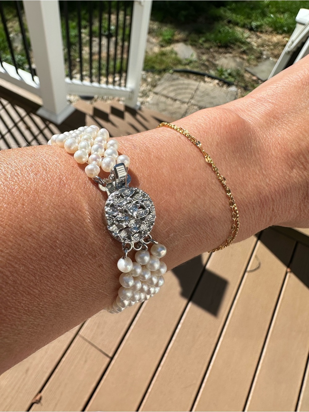 Elegant Multi-Strand Freshwater Pearl Bracelet with Textured Clasp